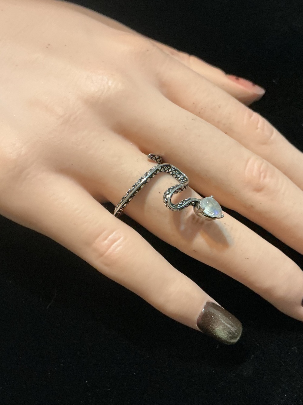 Adjust. Snake ring with moonstone head